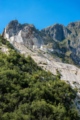 Fototapeta na wymiar Quarry of white Carrara Marble - Apuan Alps Italy