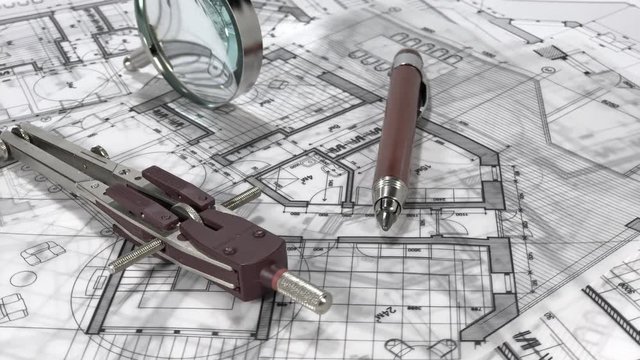 Blueprints - architectural drawings, compasses, a mechanical pencil, a magnifying glass on the surface of the architectural plan of a modern house