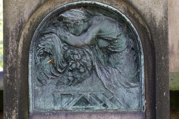 Historic Statue on the mystery old Prague Cemetery, Czech Republic