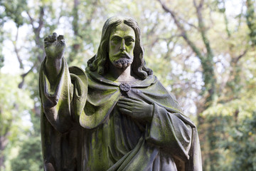 Historic Statue on the mystery old Prague Cemetery, Czech Republic