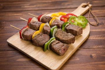 Close up meat Barbecue on Wooden Chopping Board at the Table.