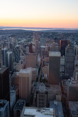Downtown Seattle at sunset with Olympic mountains in background