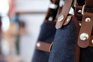 blue jeans denim & brown leather apron