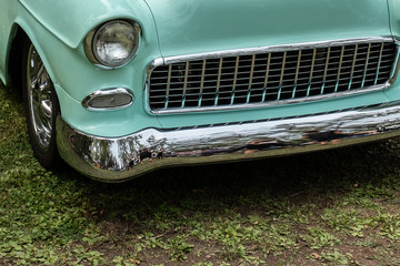 close up of 50s car with chrome grille