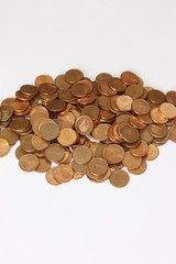 cents, cents of euro, money, mountains of cent coins, copper color on white background.