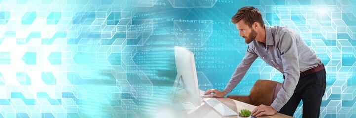 Man using computer with geometric transitions