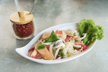Spicy vermicelli salad with minced pork and shrimp on white dish