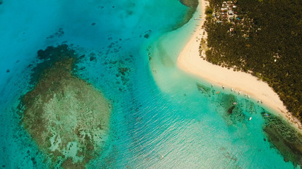 Aerial view of beautiful tropical island Daco with white sand beach. View of a nice tropical beach...