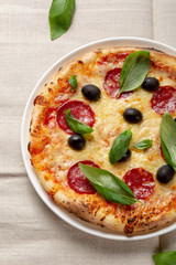 Salami pizza with black olive