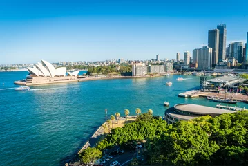 Foto op Aluminium Algemeen beeld van de torens van Sydney en de opera en de haven in de zomer © Stephane Debove