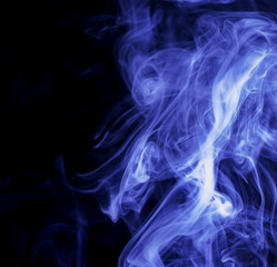 Blue smoke on black background