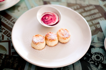 Russian syrniki or sirniki, cottage cheese pancakes
