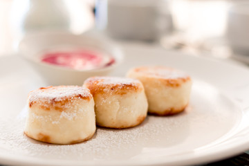 Russian syrniki or sirniki, cottage cheese pancakes