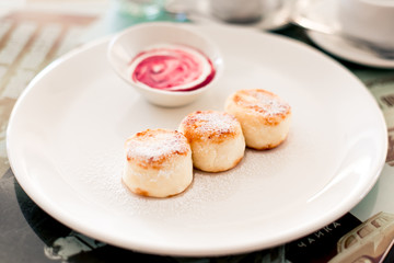 Russian syrniki or sirniki, cottage cheese pancakes