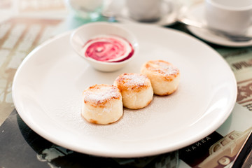 Russian syrniki or sirniki, cottage cheese pancakes