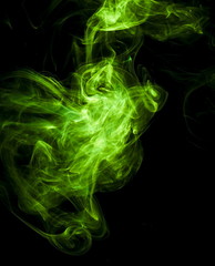 Green smoke on black background