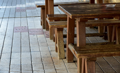 tables and bar stools in the street