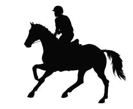 A silhouette of a horseman rides at a gallop on horseback.