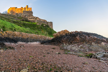 Obraz premium Mount Orgueil Castle (Gorey Castle, built 1204 - 1450), overlooking Grouville Bay in the small town of Gorey, Jersey, Channel Islands, United kingdom.