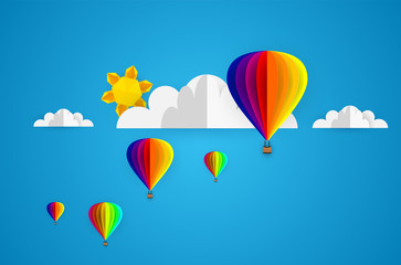 Fototapeta premium Vector origami made colorful hot air balloon and cloud.paper art and digital craft style.