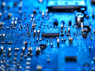 Inside of a laptop computer showing chips, circuit boards and components