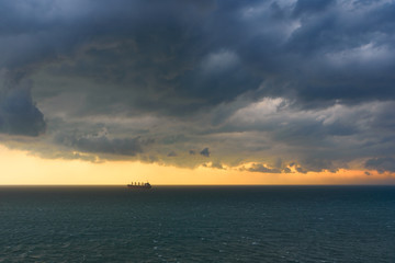 Obraz premium Tropical thunderstorm at anchorage of Vung Tau, Vietnam in Mekong river delta