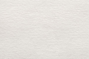 beige grainy kraft cardboard textured background