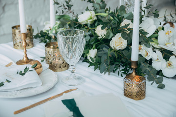 wedding decor, flowers, black and gold decor, candles.