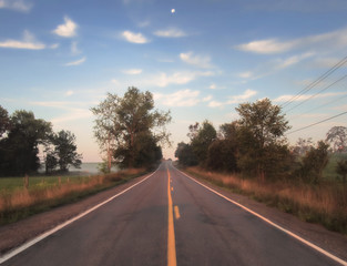 Fototapeta premium Country road at sunrise