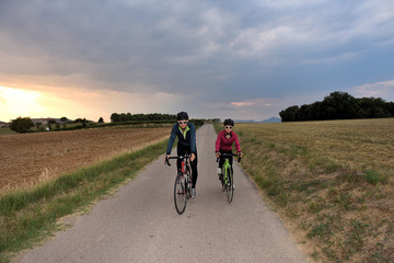 cycling couple on a road