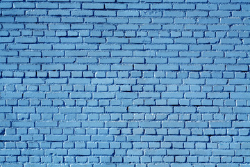 Fototapeta na wymiar Blue color old grungy brick wall surface.