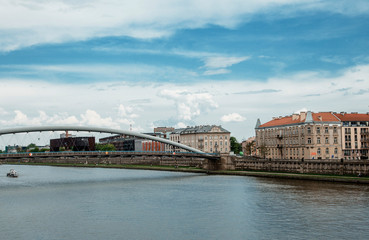 Fototapeta premium Street of the city of Krakow. The old Town. Public transport on the streets. Trams and buses. Polesha. City center.
