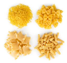 Set of four kinds of pasta on a white. The view from the top.