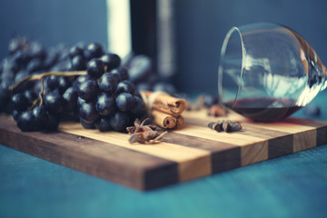blue grapes and vine in the glass