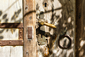 Old antique church door with old door lock