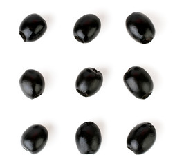 Nine marinated pitted olives on a white, isolated. The view from the top.