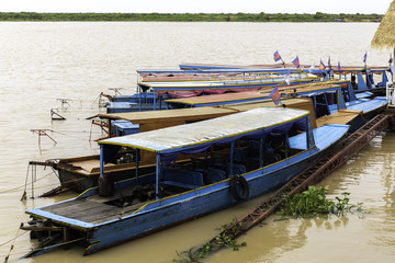 SIEM REAP, CAMBODIA - Tour boats at Tonle Sap lake, the largest freshwater lake in Southeast Asia and was designated as a UNESCO biosphere reserve.