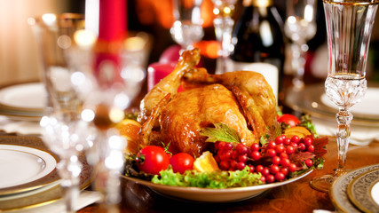Fototapeta na wymiar Closeup image of baked chicken on big dish at CHristmas eve