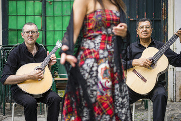 Fado band performing traditional portuguese music in Alfama, Lisbon, Portugal