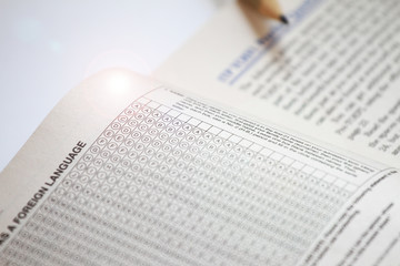 TEST. English test choose the right answer. English grammar test sheet. Multiple choice test. Exam for students in school, college and university. USA or English Education concept. answer sheet.