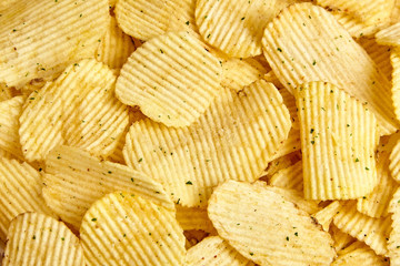 rippled potato chips with condiment