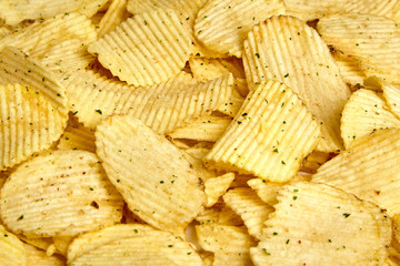 rippled potato chips with condiment