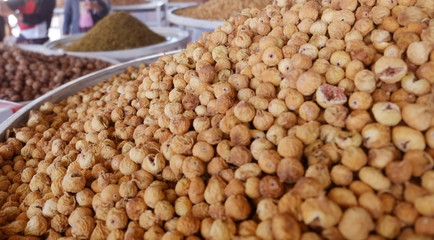 Heap dried figs for sale at a nuts and dried fruits shop.