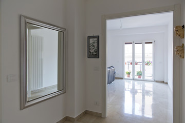 Modern apartment. White corridor and room