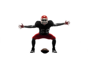 Active one american football player isolated on white background. Fit caucasian man in uniform posing as winner over studio background. Win, Human emotions and facial expressions concept