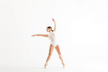 Female Ballet Dancer Wearing Leotard While Dancing With Grace
