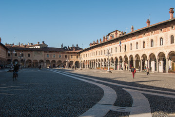 Obraz premium Ducale square with original greek frescoes on historic buildings in Vigevano