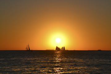 Fototapeta na wymiar Beautiful sunset on the ocean,with some boats, in Key West,USA