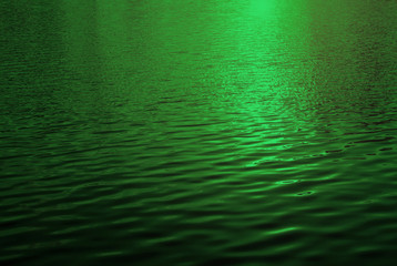 Rippling green water surface, water river for background