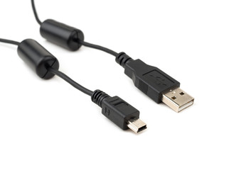 Printer and camera USB Cable on white background, selective focus